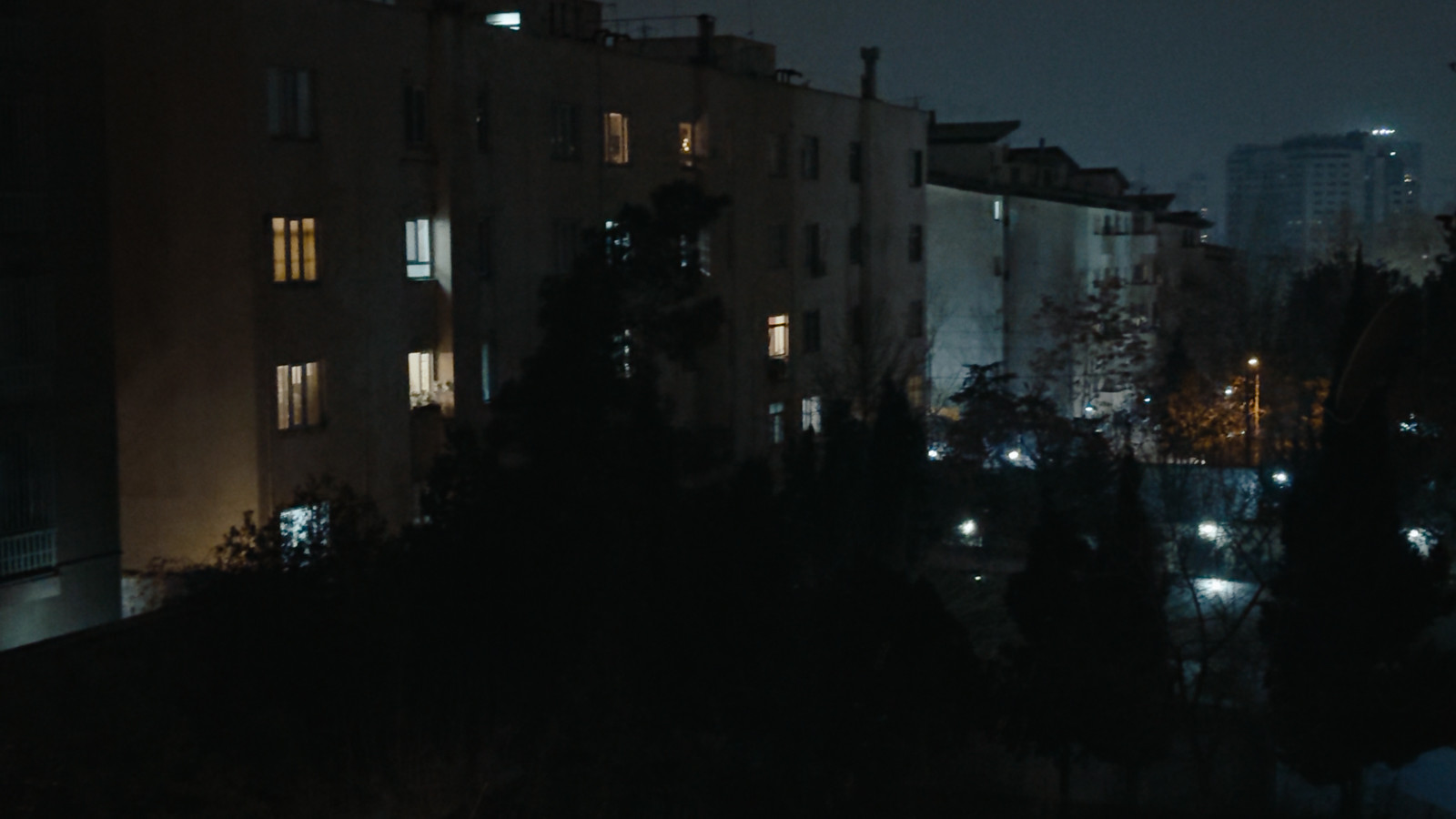 A residential block of buildings at night