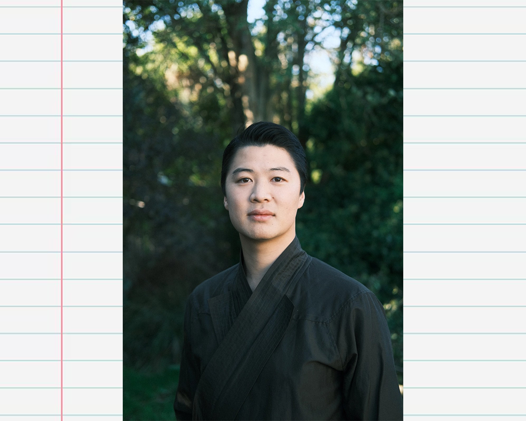 A headshot of Steven Junil Park on an exercise book paper background