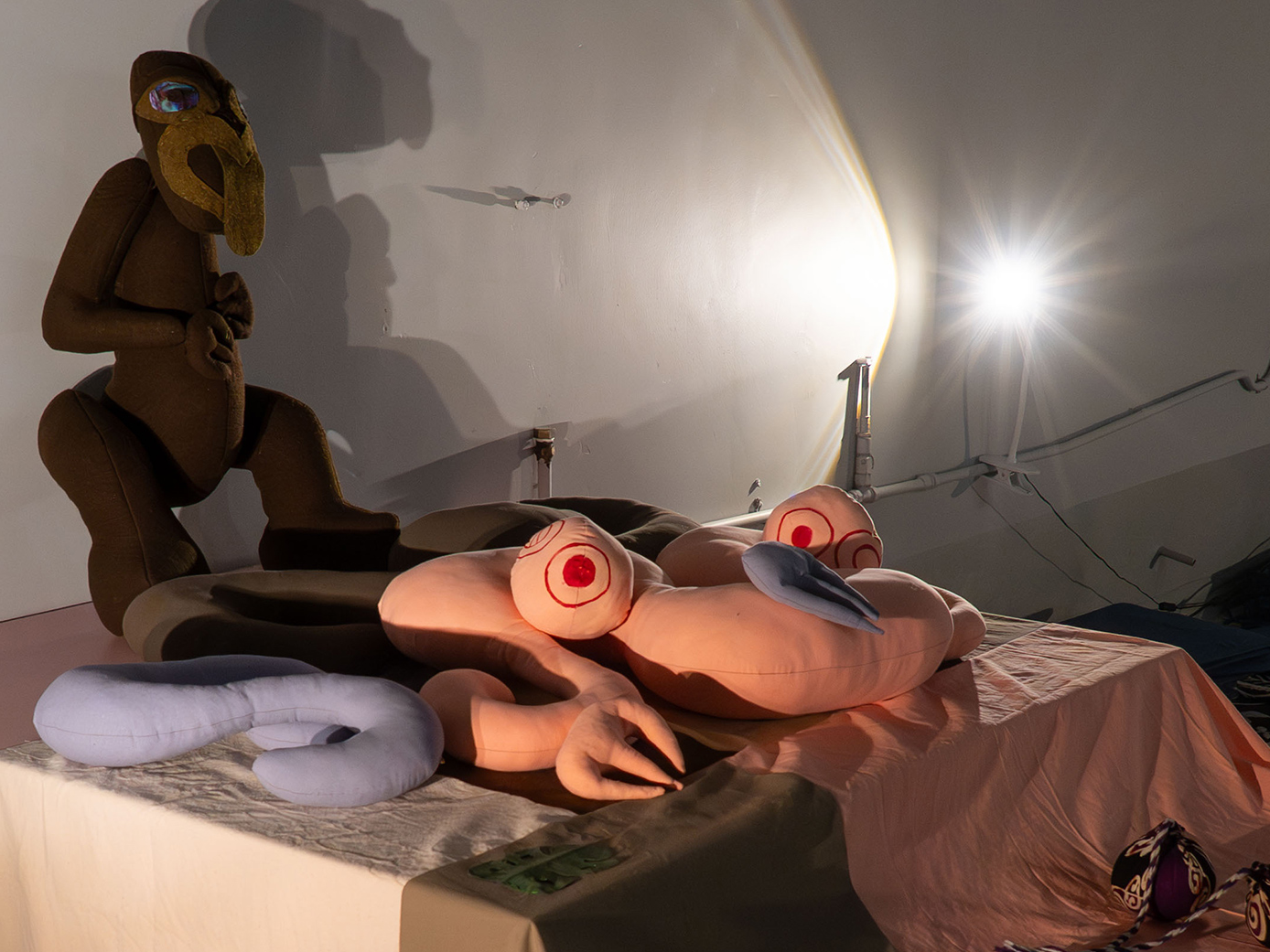 A few soft sculptures displaying on a platform